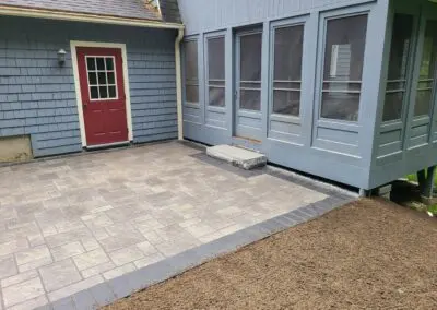 Concrete floors on the patio of a house - hardscapes hampstead nh