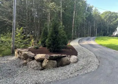 Natural landscape with rocks and small trees - hardscapes brookline nh