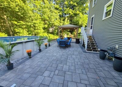 Modern patio with concrete floors by Modena NH - hardscapes amherst nh