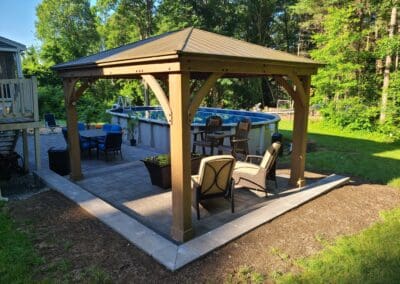 Hut with modern armchairs in patio made by Modena NH - hardscapes bedford nh