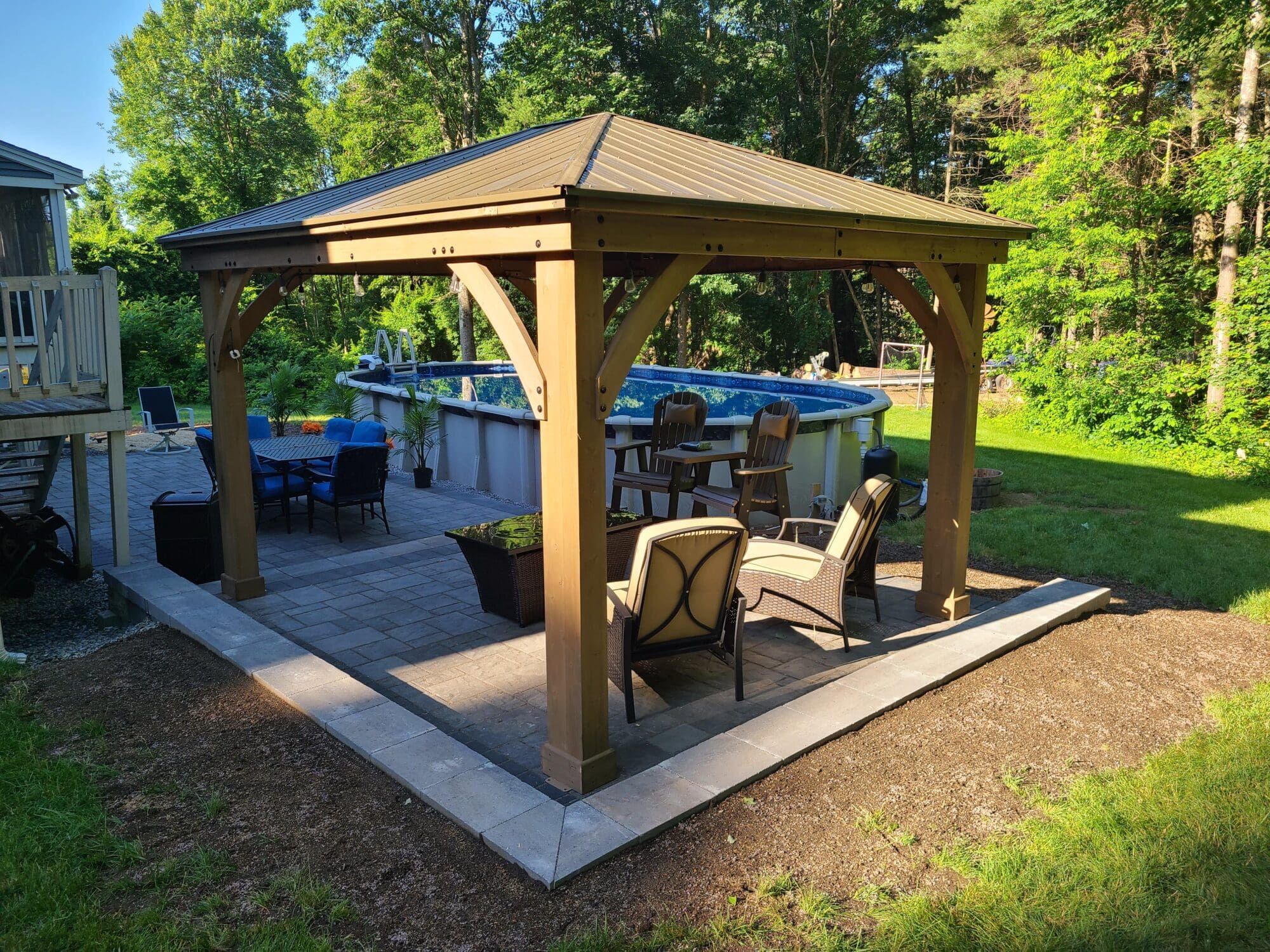 Hut with modern armchairs in patio made by Modena NH - hardscapes bedford nh