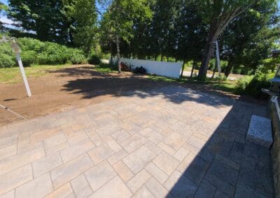 Process of concrete patio flooring by Modena NH - landscape design near me