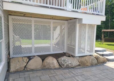 Concrete floors with decorative natural stones in a house by Modena NH - hardscape contractors near me