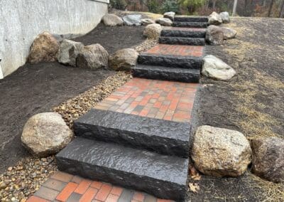 Brick walkway with concrete steps made by Modena NH - hardscapes hudson nh