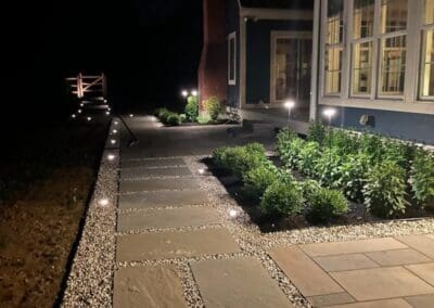 Illuminated walkway by Modena NH - landscape designers near me