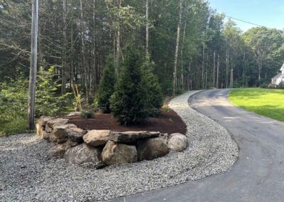 Natural landscape with rocks and small trees - hardscapes brookline nh